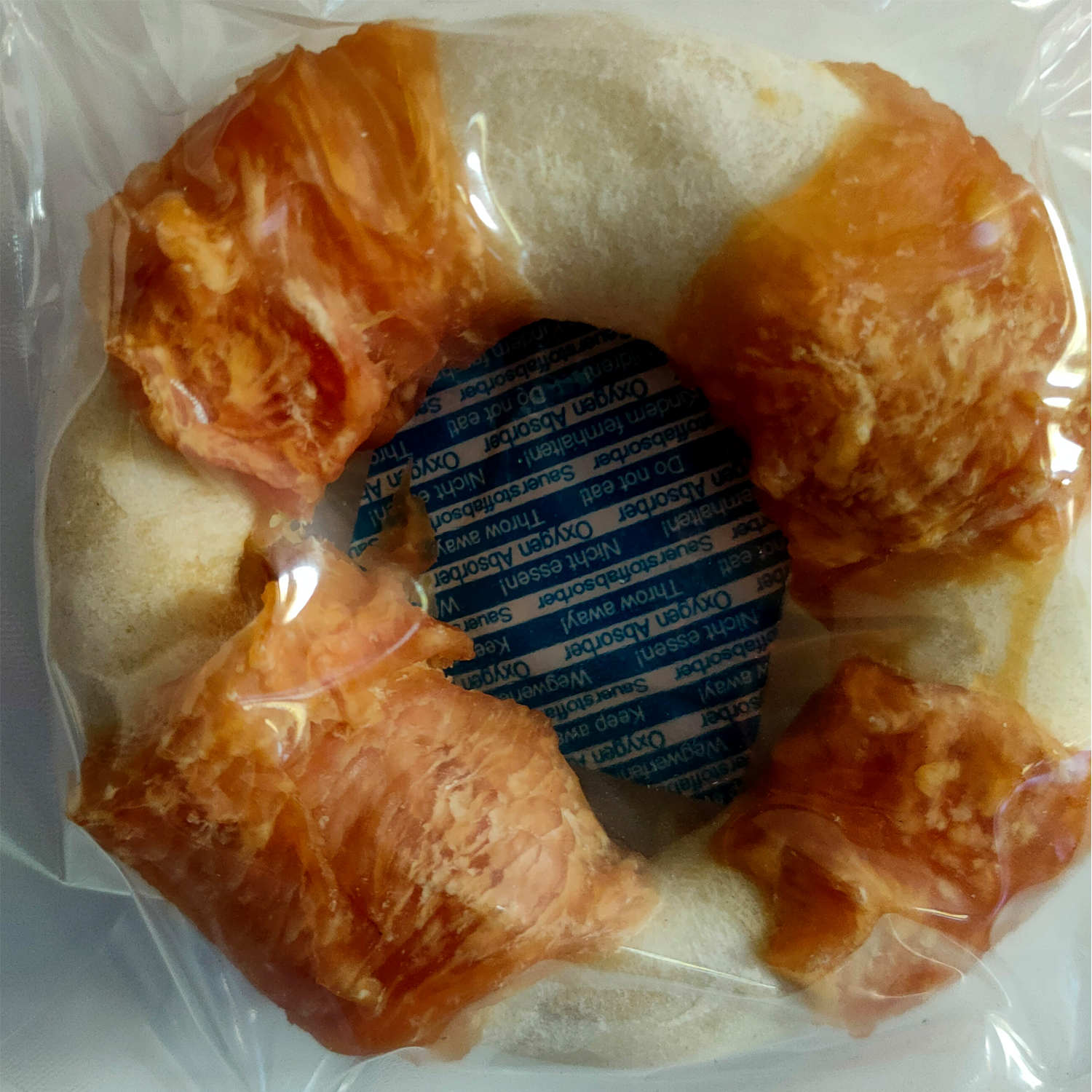 Foamed rawhide dounuts wrapped with chicken
